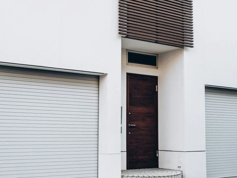 Illustration showing a home with a garage door
